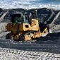 Sumber foto Tempo : Escavator sedang melakukan kegiatan pengerukan pasir laut 